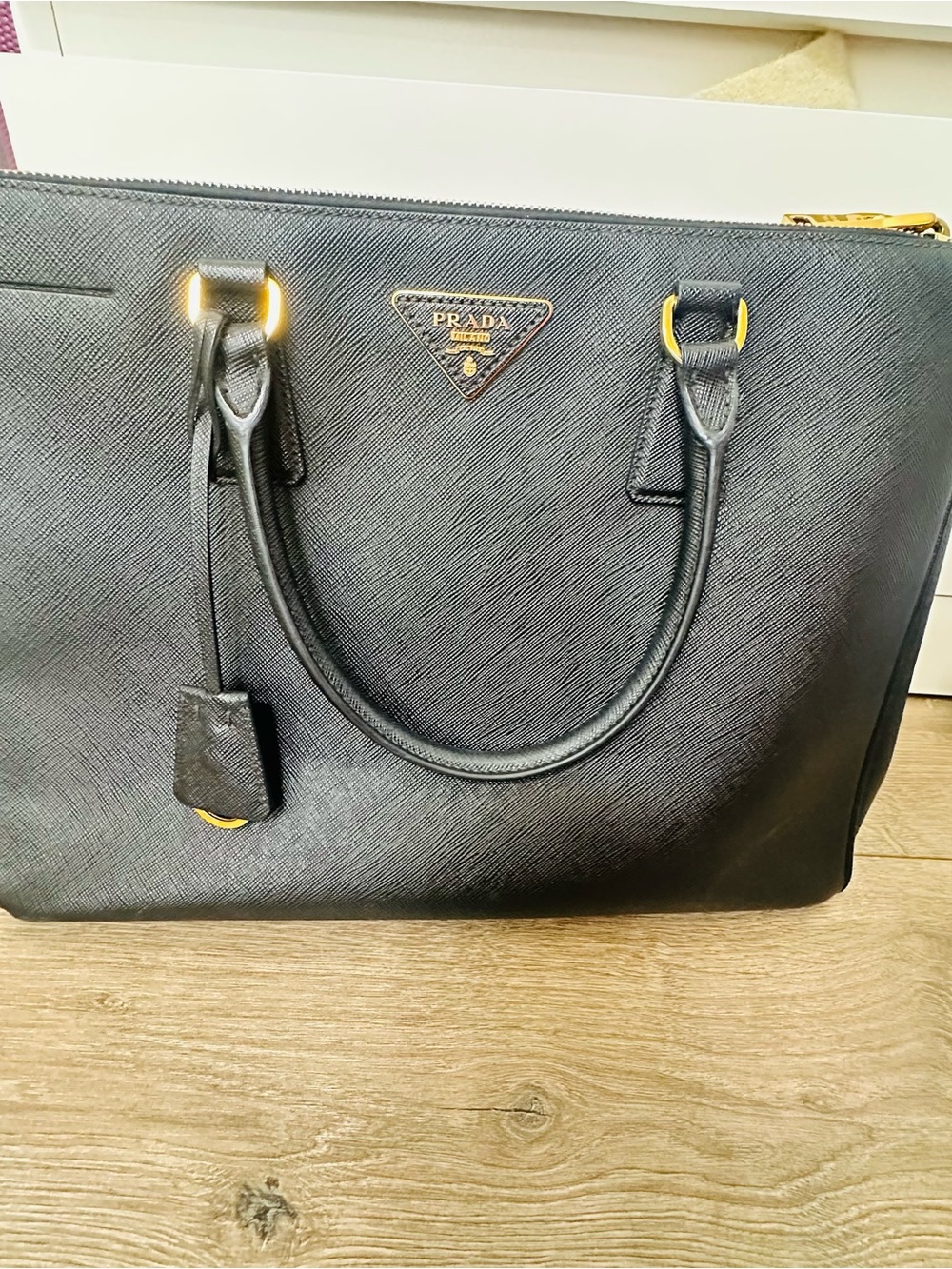 Authentic Prada Black Saffiano Leather Satchel with Gold Accents